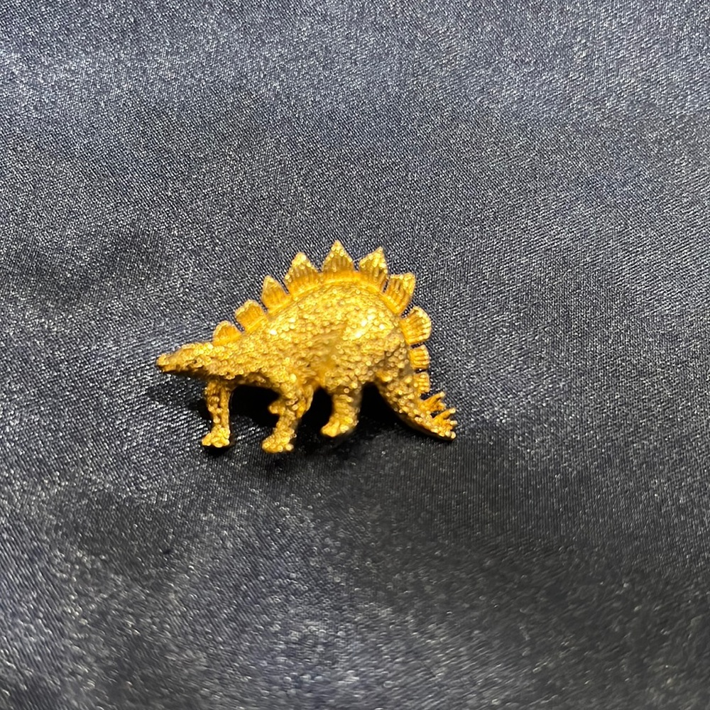 Vintage gold dinosaur pin